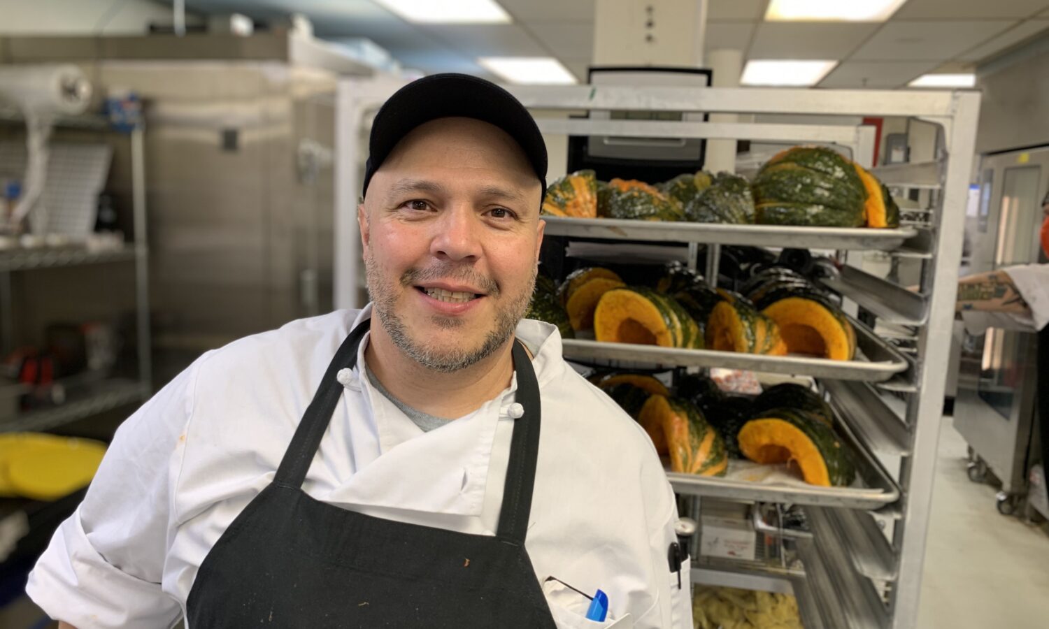 FareStart Job Training Program graduate Michael smiling in the kitchen