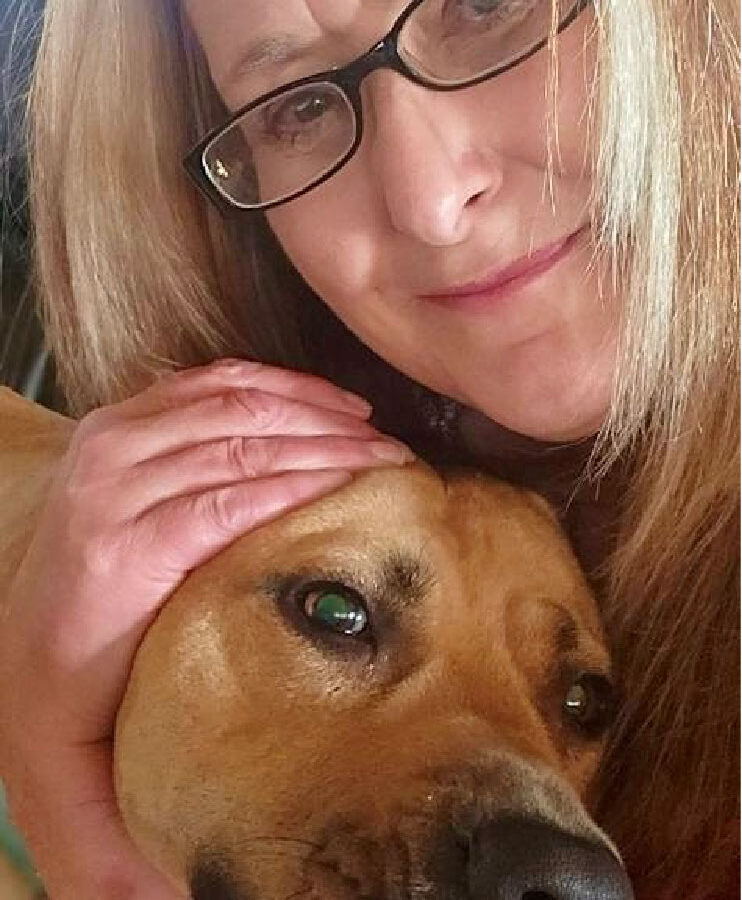 FareStart Online Learning Program graudate, Vicky with her dog