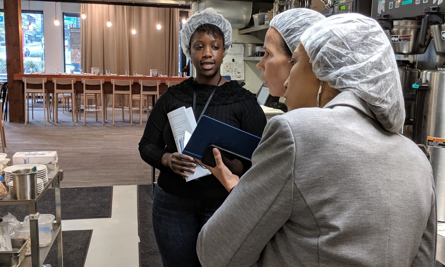 FareStart Consulting discussing job training in the kitchen