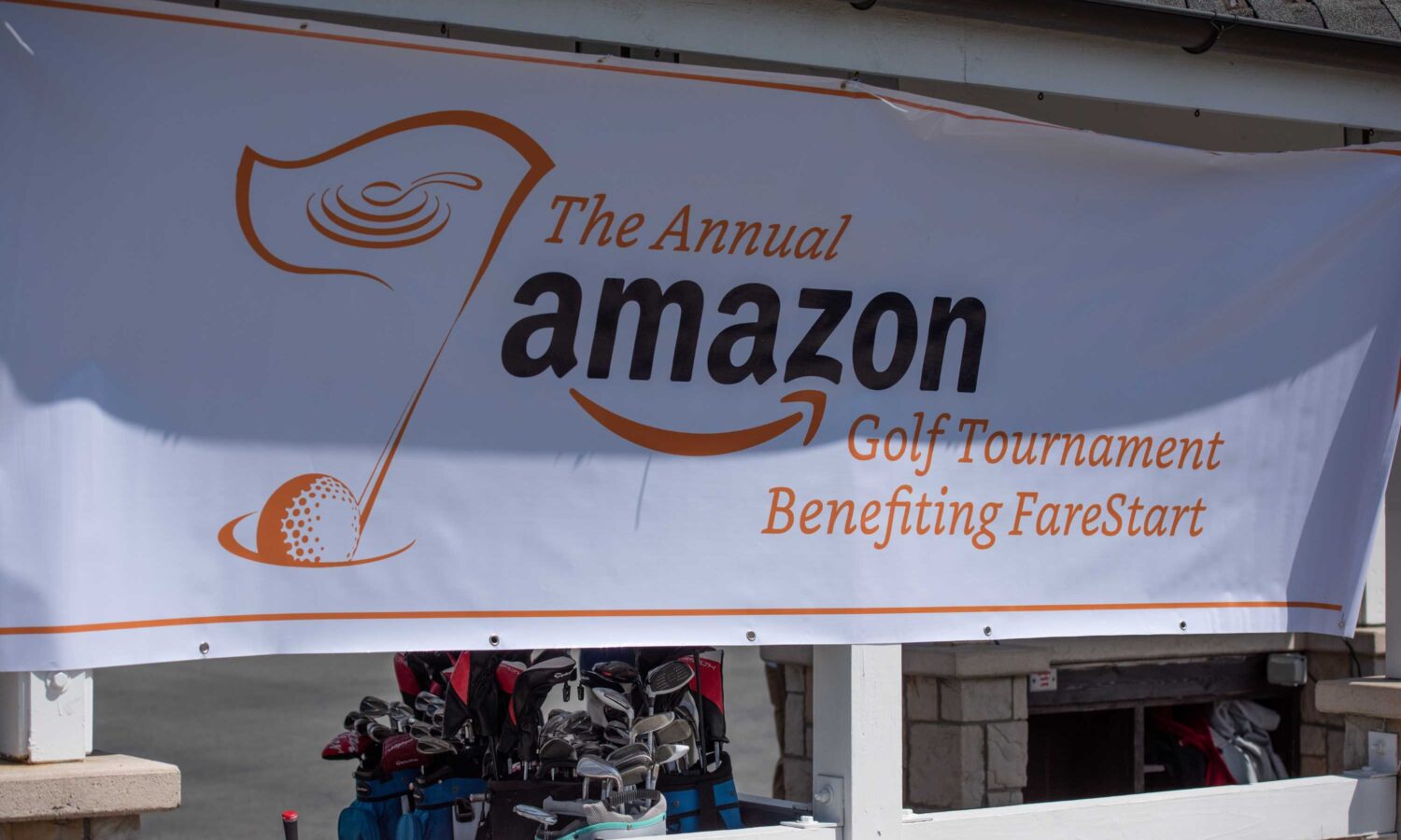 Banner from the 22nd Annual Amazon Golf Tournament