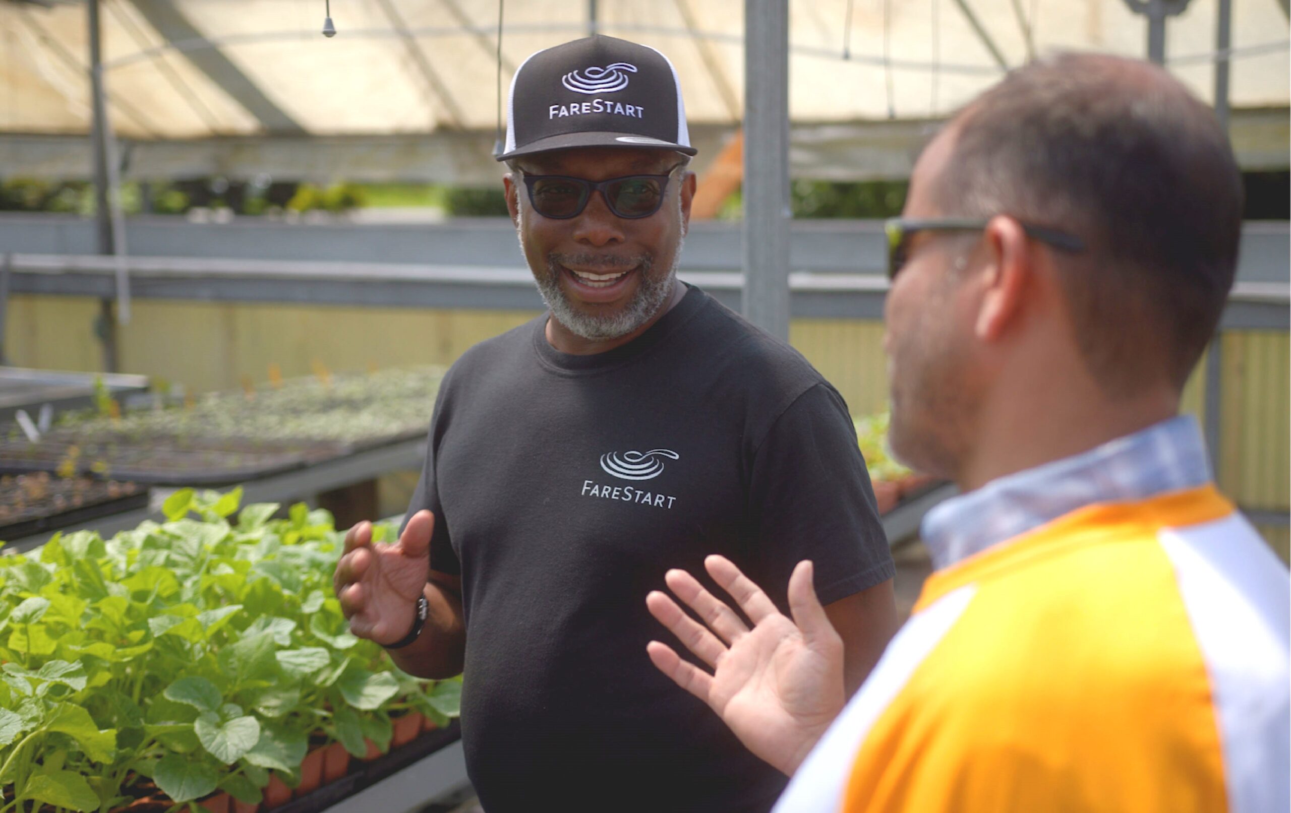 Chef Wayne on the farm with a farm partner