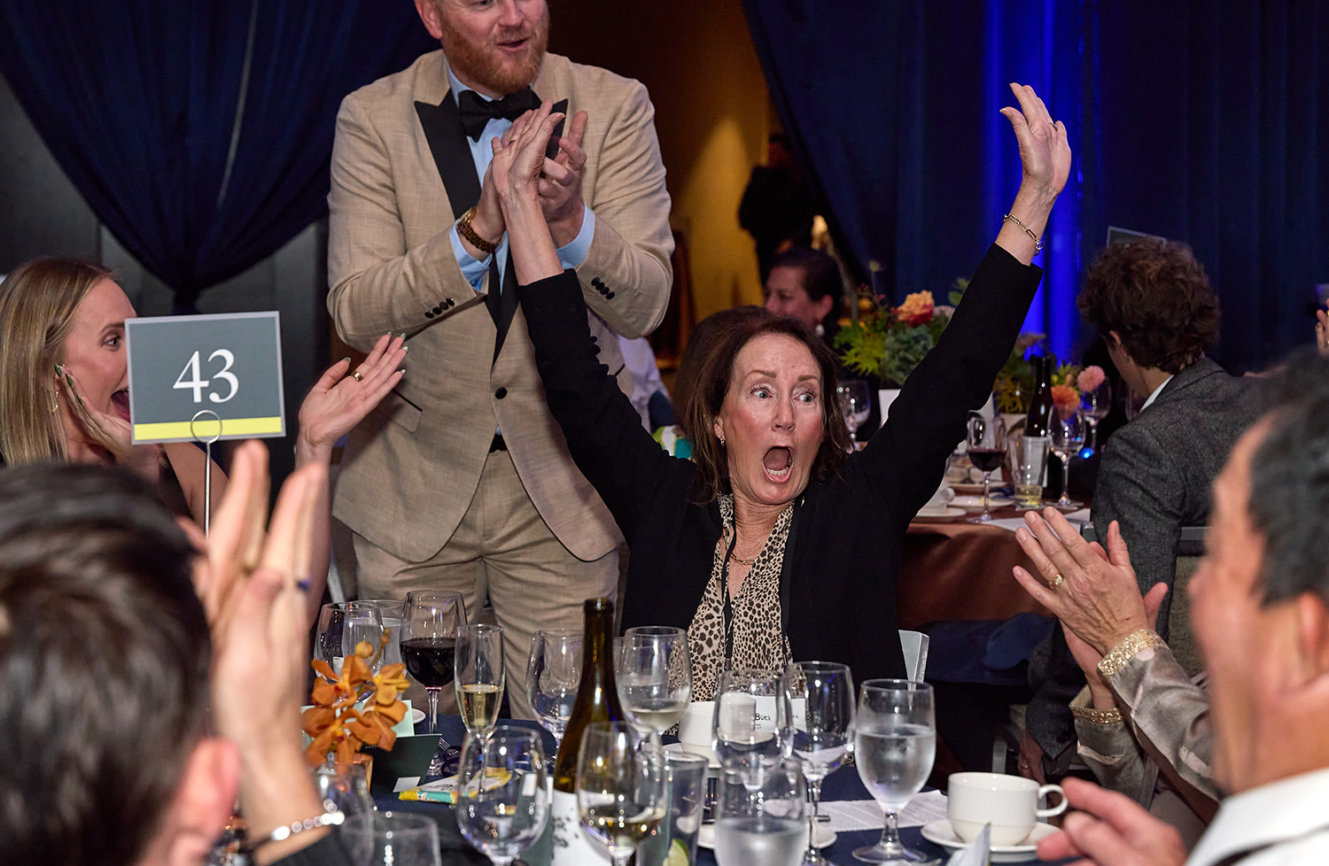 Guest Celebrating Winning an Auction Item at the 32nd Annual Gala Auction & Dinner