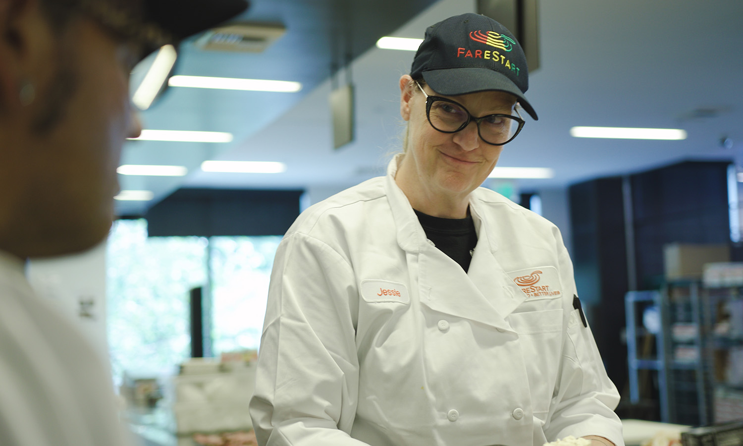 Jessi with a FareStart student