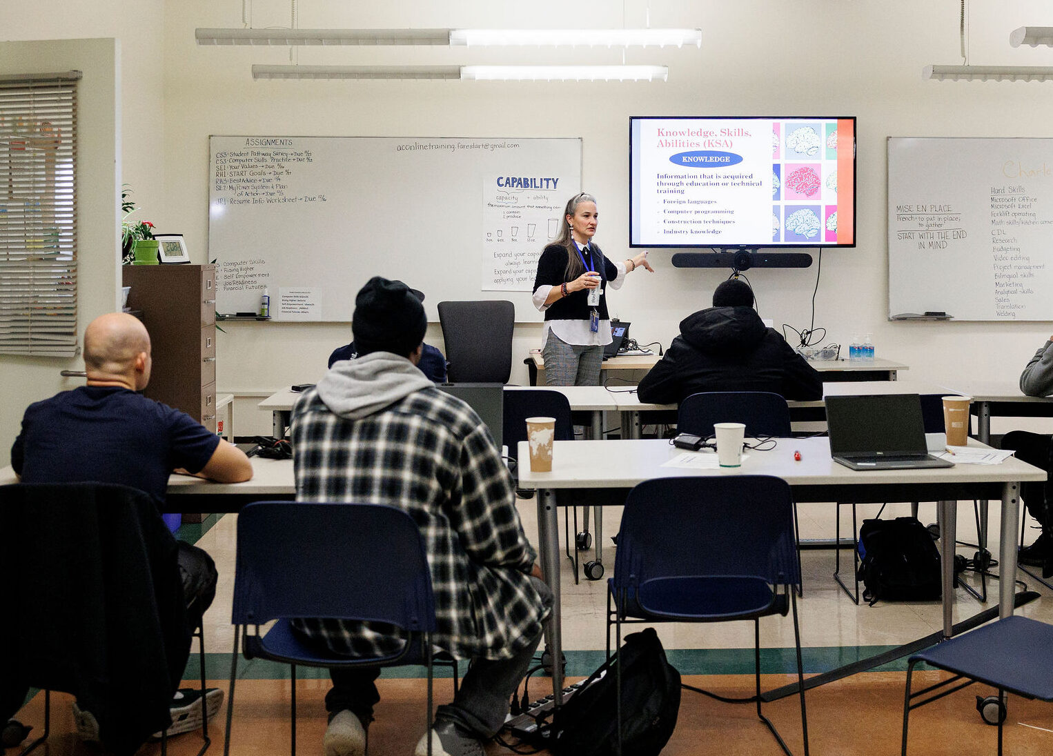FareStart instructor teaching Food Pathways Program students in the classroom