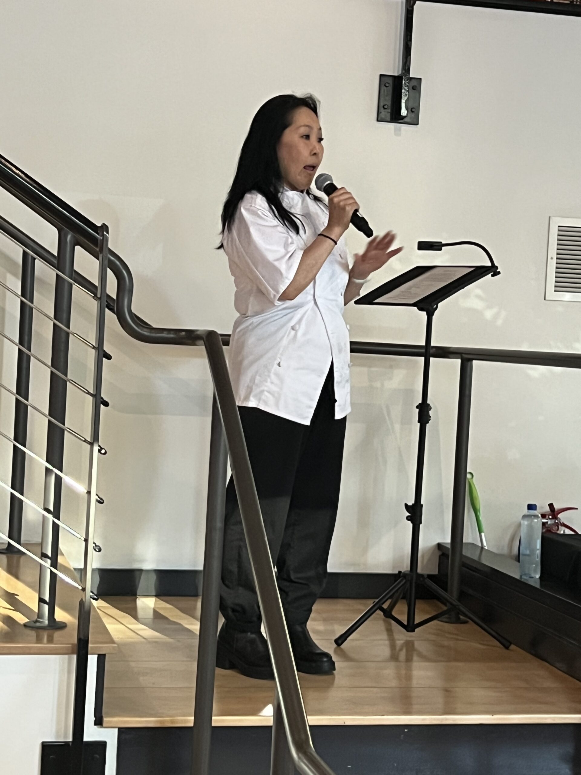 FareStart graduate speaking at a Guest Chef Night