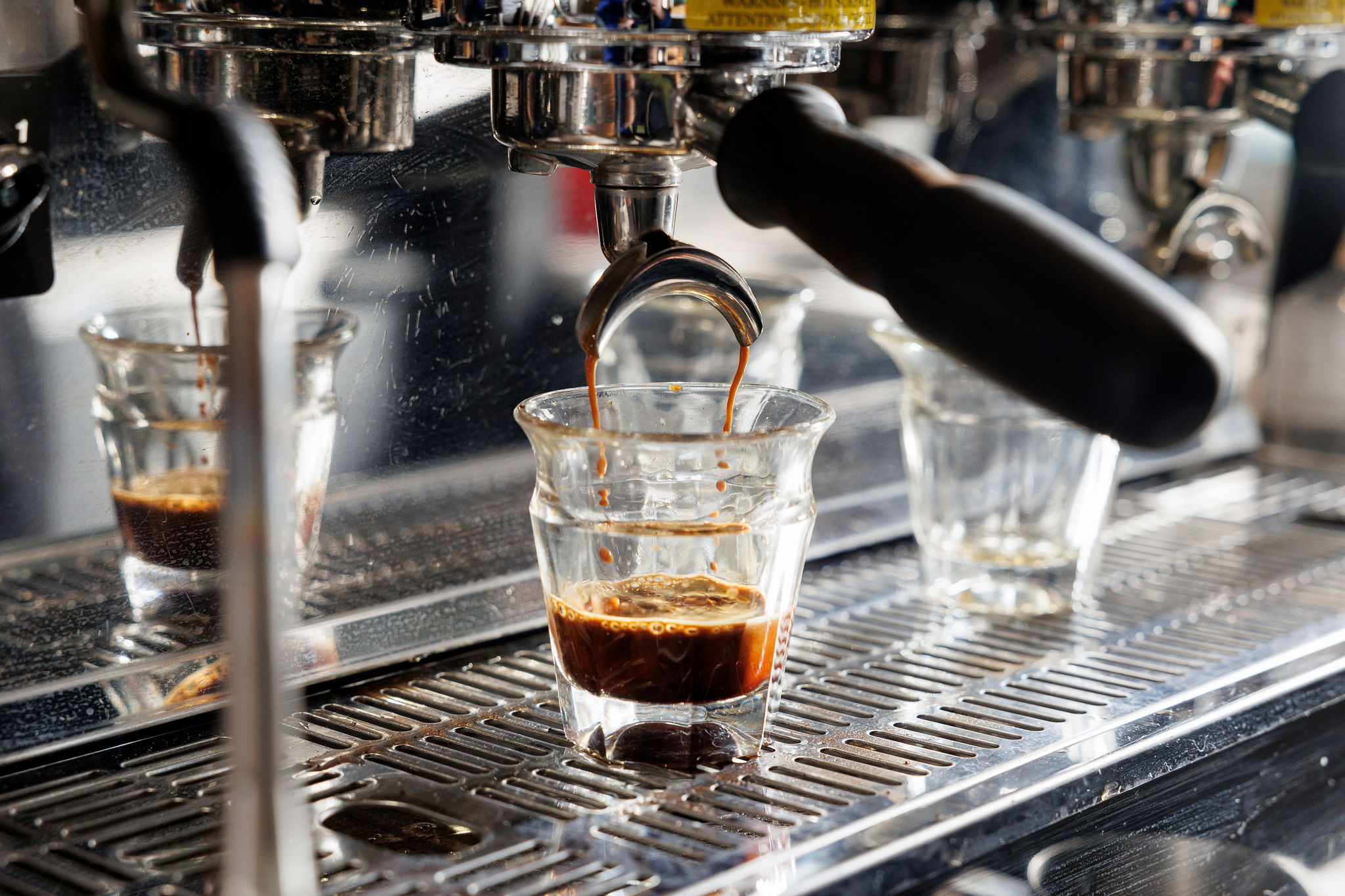 An espresso machine pulling an espresso shot