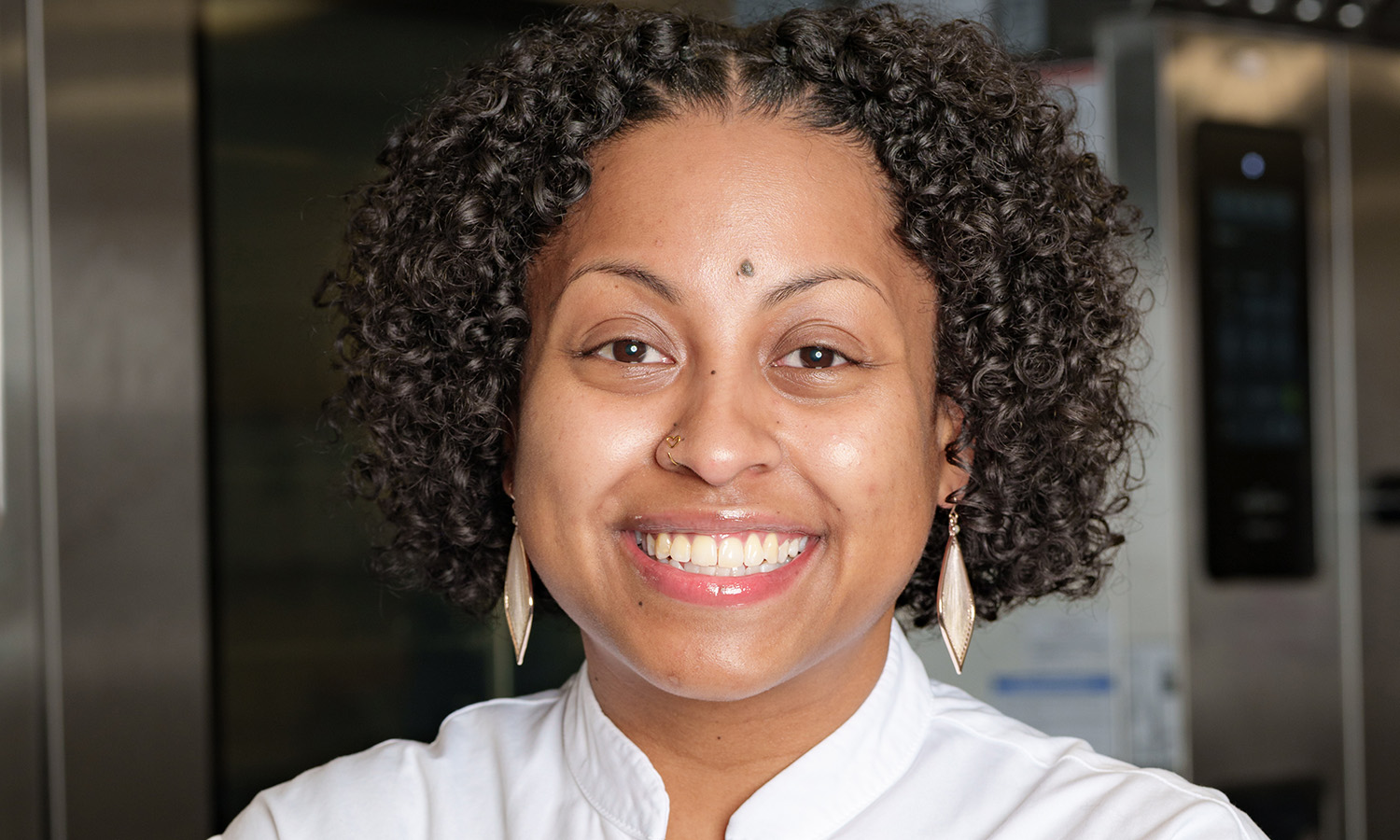 Sharette, a FareStart graduate smiling