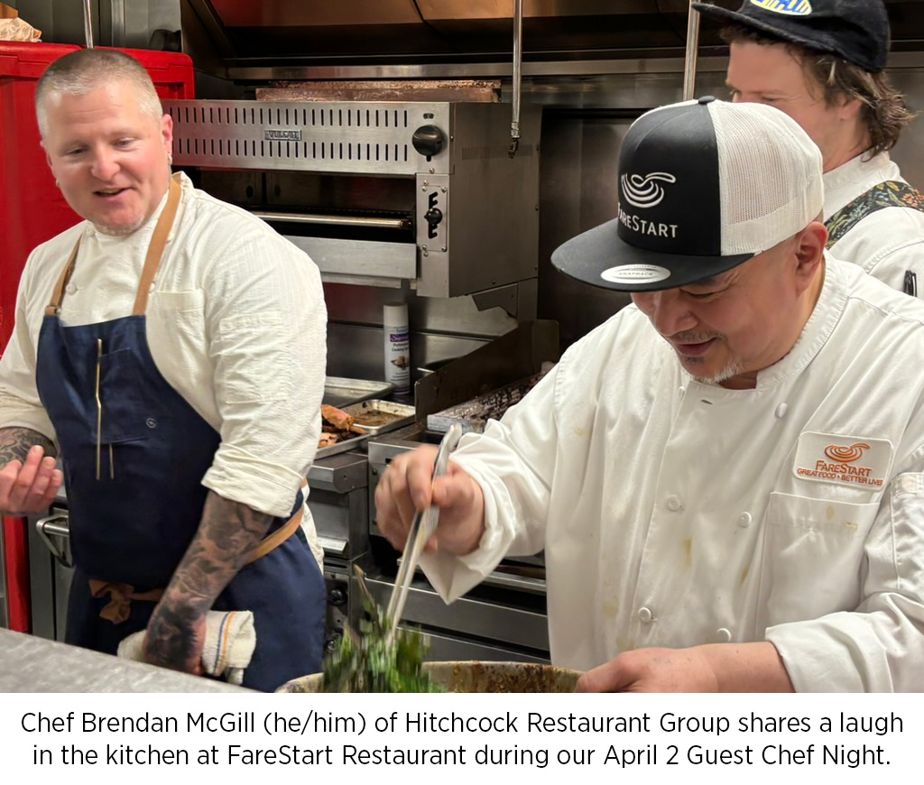 Chef Brendan McGill (he/him) of Hitchcock Restaurant Group shares a laugh in the kitchen at FareStart Restaurant during our April 2 Guest Chef Night