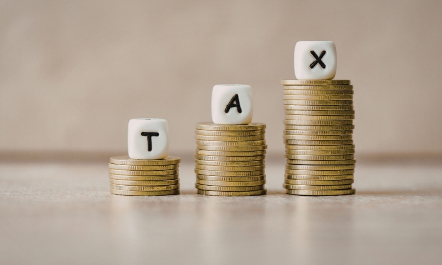 Three dice with the letters 