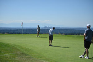 Amazon employees golfing during the 2026 Amazon Annual Golf Tournament benefiting FareStart